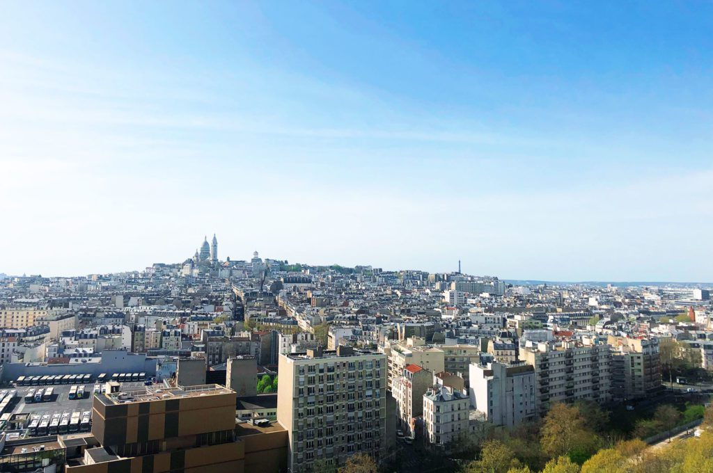View of Montmartre from building with Renova illuminated advertising