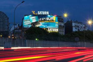 Former illuminated advertisement and giant poster for Saturn on the Paris ring road in 2010