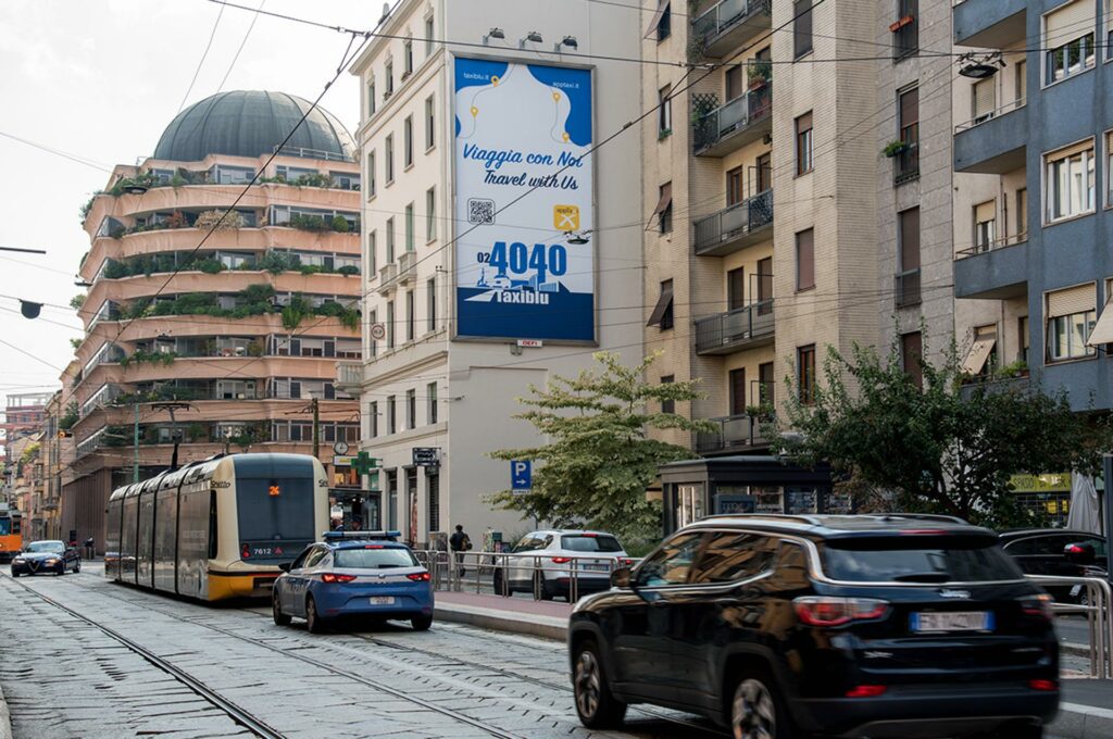 Advertising banner for AppTaxi in Milan, Italy