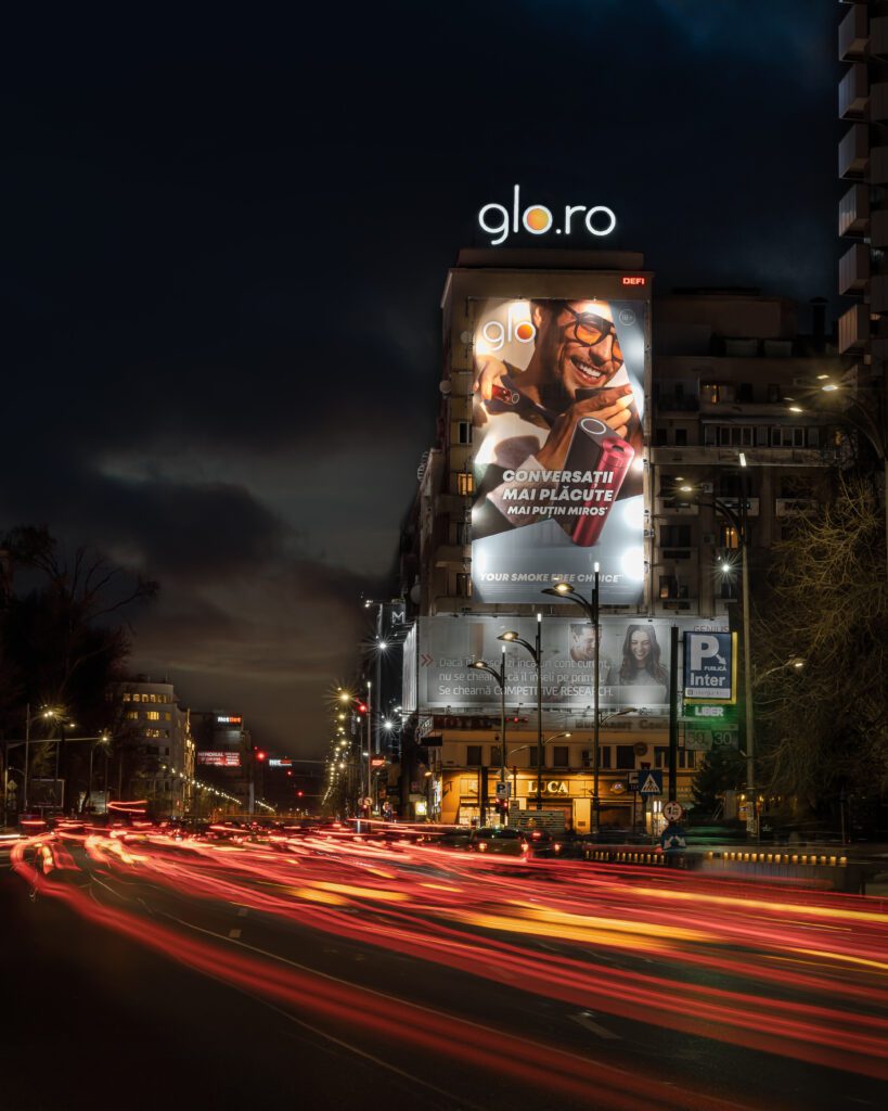 Illuminated advertising and giant banner for Glo in Bucharest